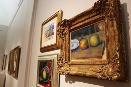 A Cézanne hangs among other still life paintings. photo by Sarah Rohleder