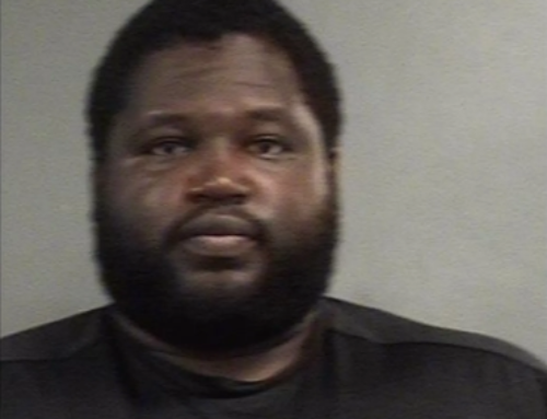 Update: U of L football coach has charges dropped
