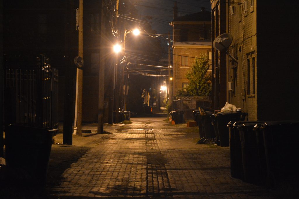 Alley in Louisville illuminated by a street light