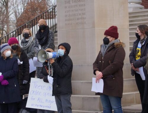 Protestors rally at Grawemeyer Hall against COVID-19 policy