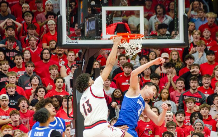 Sananda Fru dunks during the rivalry game versus the University of Kentucky at the KFC Yum Center on November 11, 2025 (Photo by Nolton Alfred / The Louisville Cardinal)