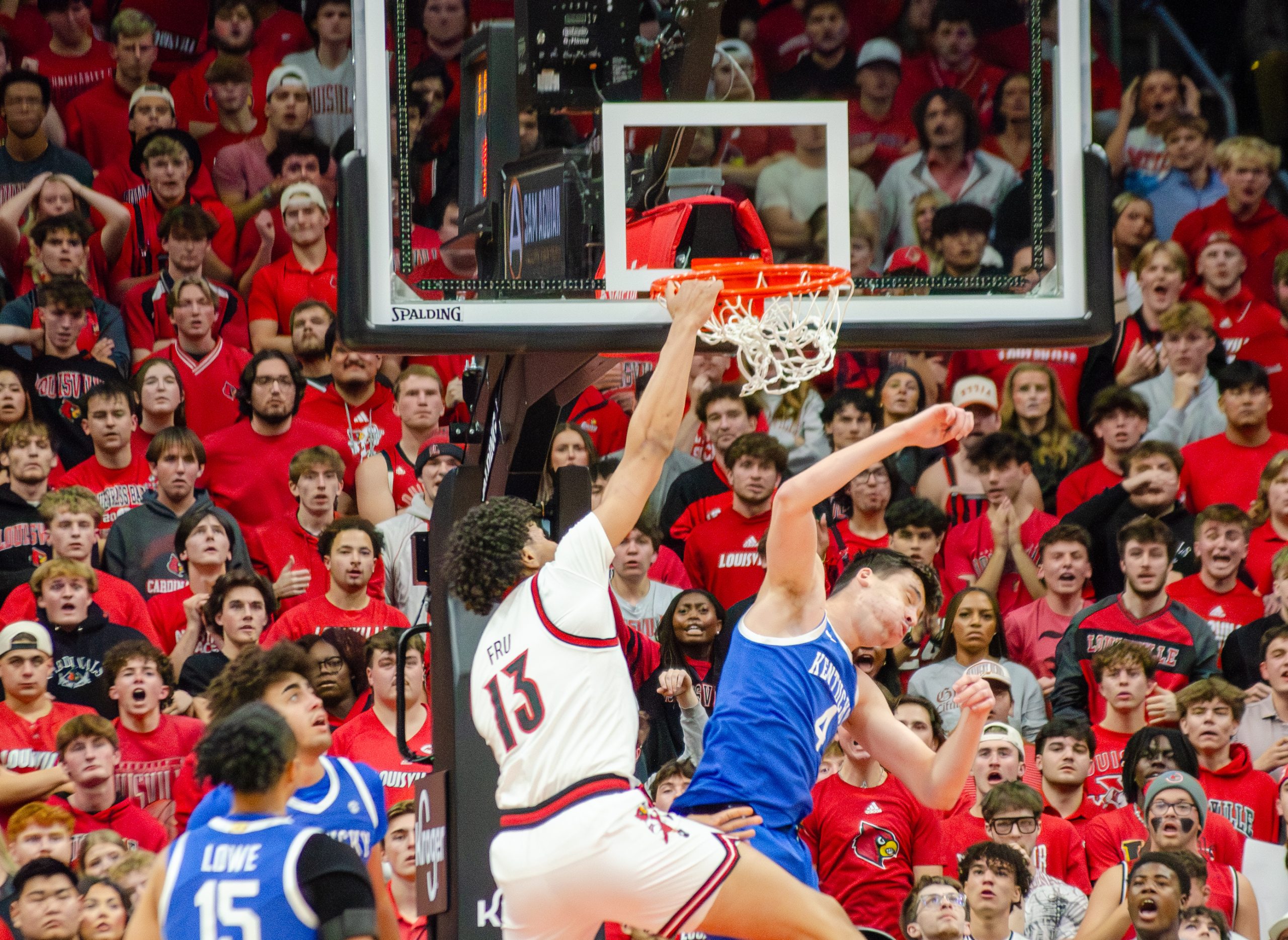 Sananda Fru dunks during the rivalry game versus the University of Kentucky at the KFC Yum Center on November 11, 2025 (Photo by Nolton Alfred / The Louisville Cardinal)