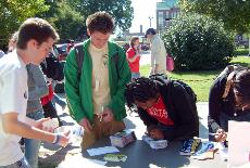 Student political groups are passing out information around campus to encourage voting in the elections.